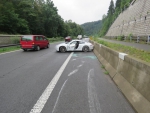 Nabourané Porsche 911 Carrera na silnici I. třídy č. 35 za sjezdem na Jablonec ve směru na Turnov