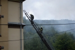 Požár čtyřpodlažního bytového domu v ulici Železnobrodská v Tanvaldě