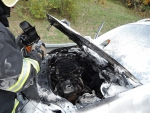 Požár osobního automobilu na silnici I/35 u odbočky na Jeřmanice ve směru z Turnova na Liberec