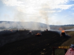 Požár lisu balíků na poli v Sedmihorkách