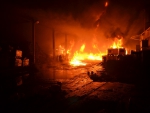 Zásah hasičů při požáru skladovací haly v Lomnici nad Popelkou